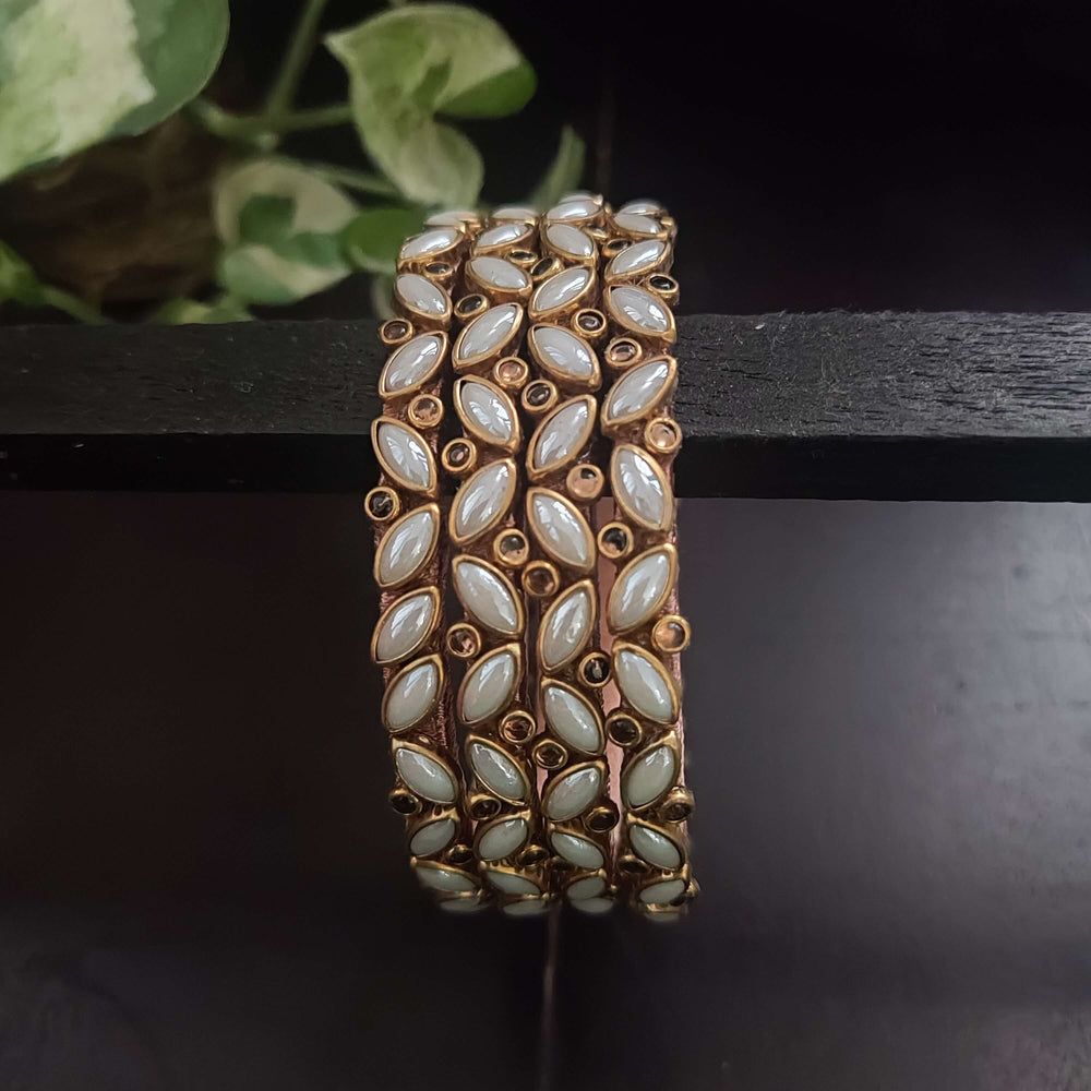 Pearl kundan zig zag silk thread bangles