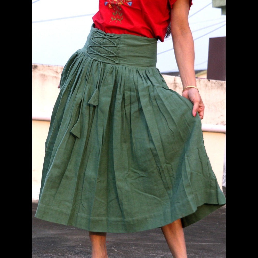 
                  
                    ZEPHYRINE "- Olive  Green Corset-Skirt with sewn-in boning accentuated by a flared pleated Midi A-Line Skirt with Pockets.
                  
                
