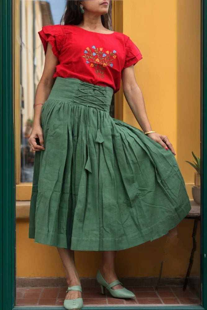 
                  
                    ZEPHYRINE "- Olive  Green Corset-Skirt with sewn-in boning accentuated by a flared pleated Midi A-Line Skirt with Pockets.
                  
                