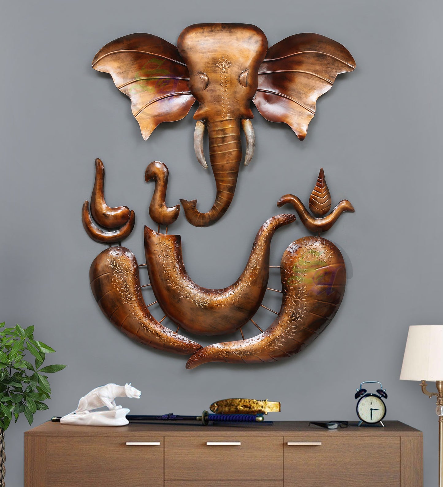 Elegant handcrafted iron wall décor featuring Lord Ganesha playing the guitar, showcasing exquisite modern and minimalistic design, perfect for home decoration or as a gift.