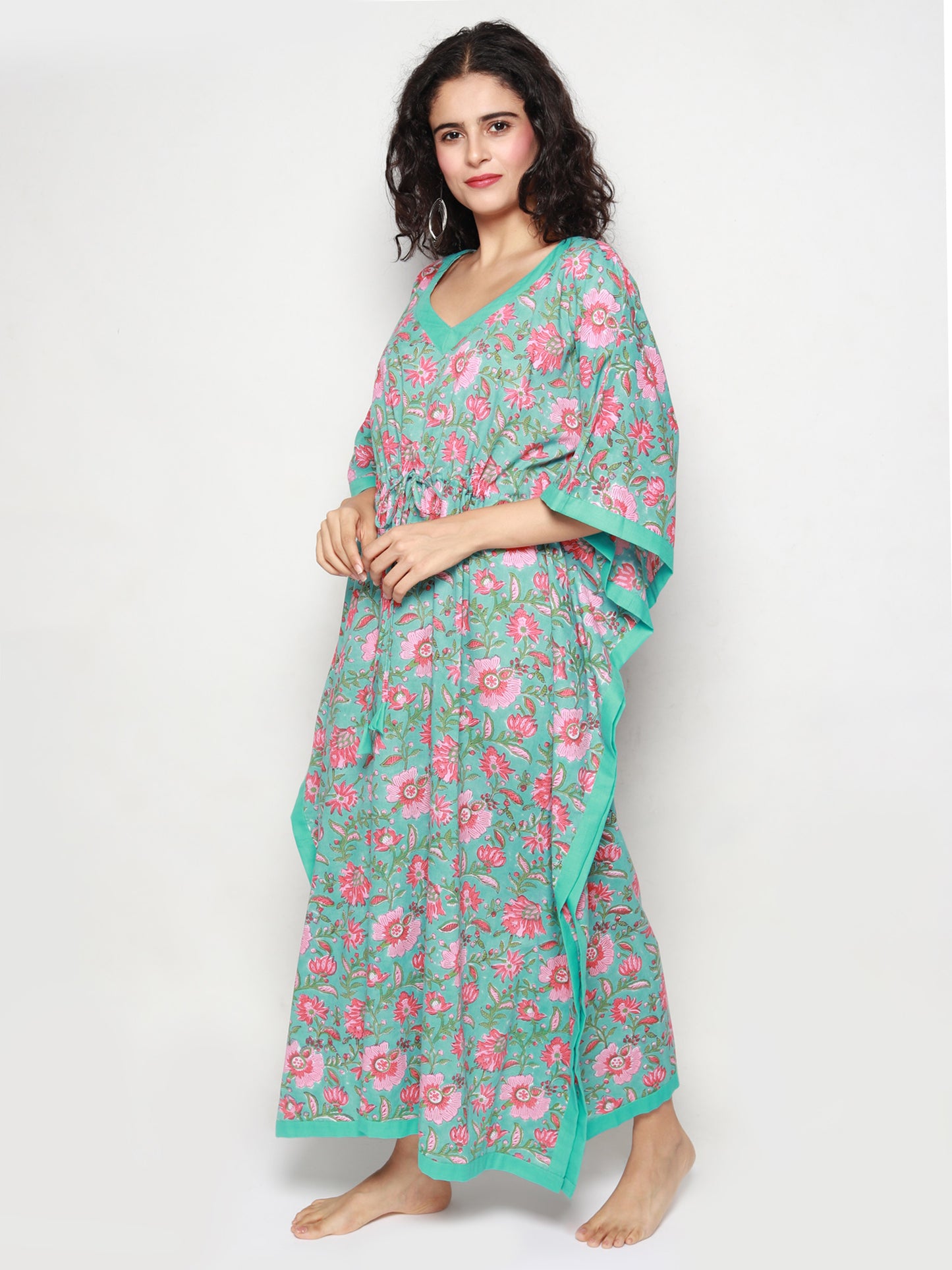 
                  
                    Turquoise Cotton Kaftan with Peach Floral Print
                  
                