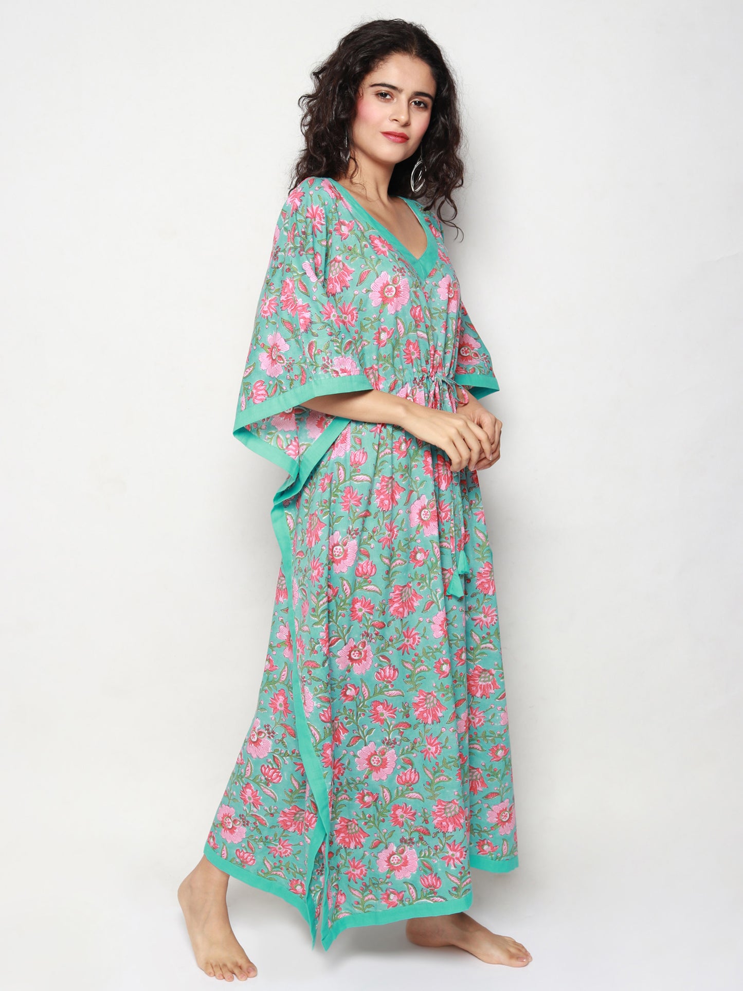 
                  
                    Turquoise Cotton Kaftan with Peach Floral Print
                  
                
