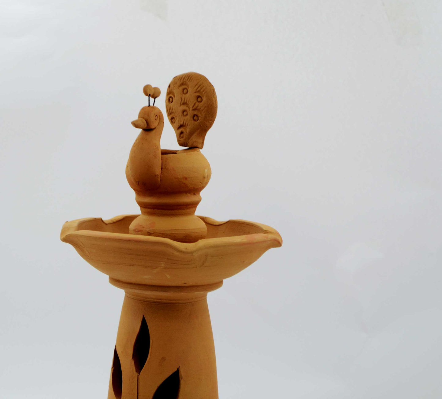 
                  
                    Handmade-Peacock-Design-Terracotta-Samai-Oil-Lamp
                  
                