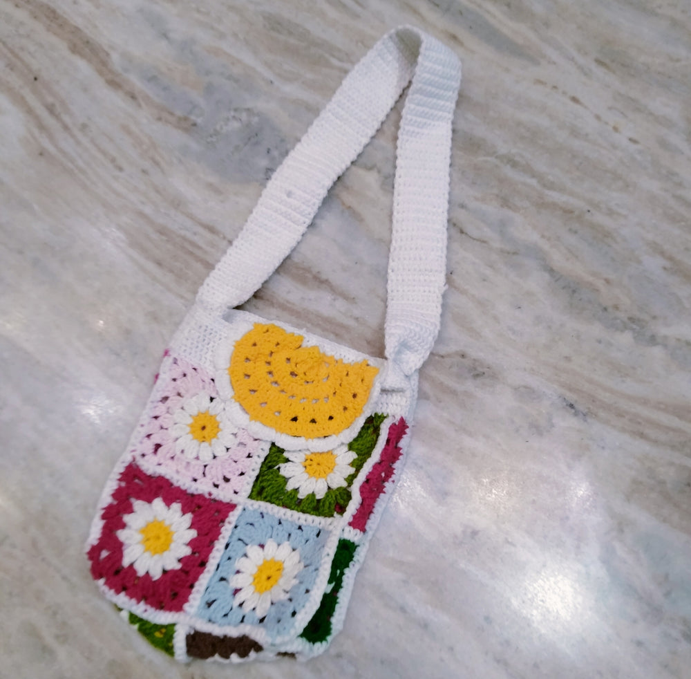 Crochet daisy sling bag