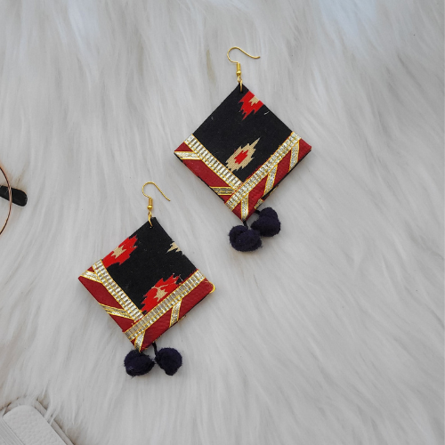
                  
                    Tales of Ikat -  Fabric Earrings with pom pom
                  
                