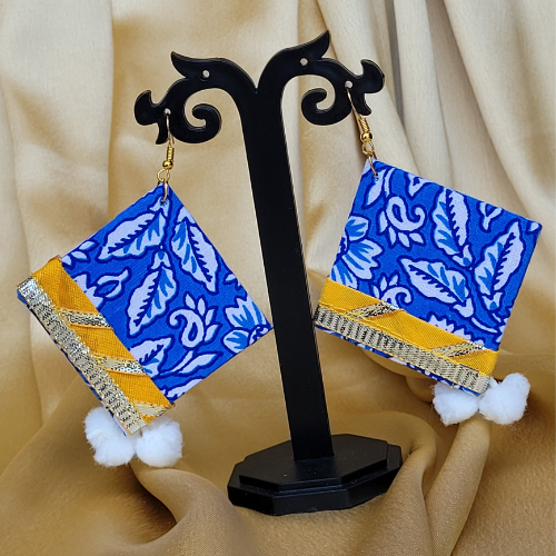 
                  
                    The blue Heaven - Fabric Earrings with pom pom
                  
                