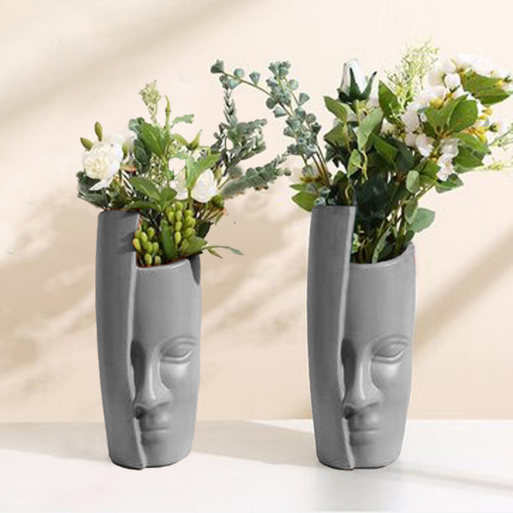 
                  
                    Half-Face Planters/Pots (Set of 2)
                  
                