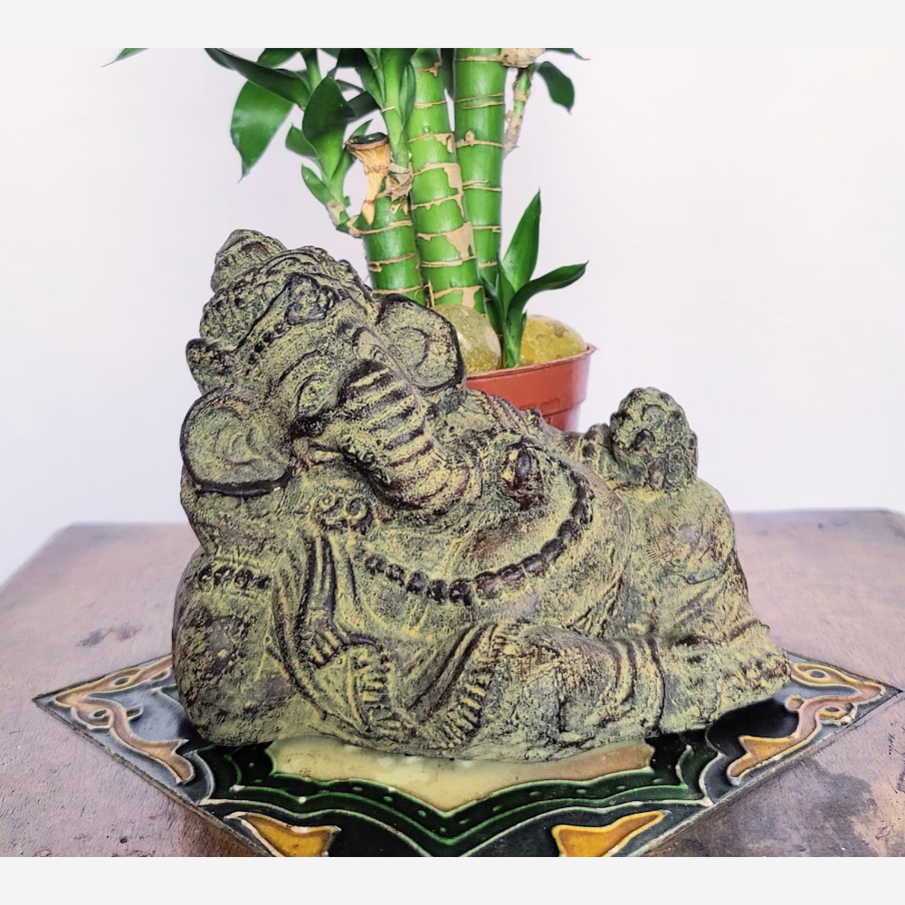 
                  
                    Cute, Resting Lord Ganesha Stone Figurine
                  
                