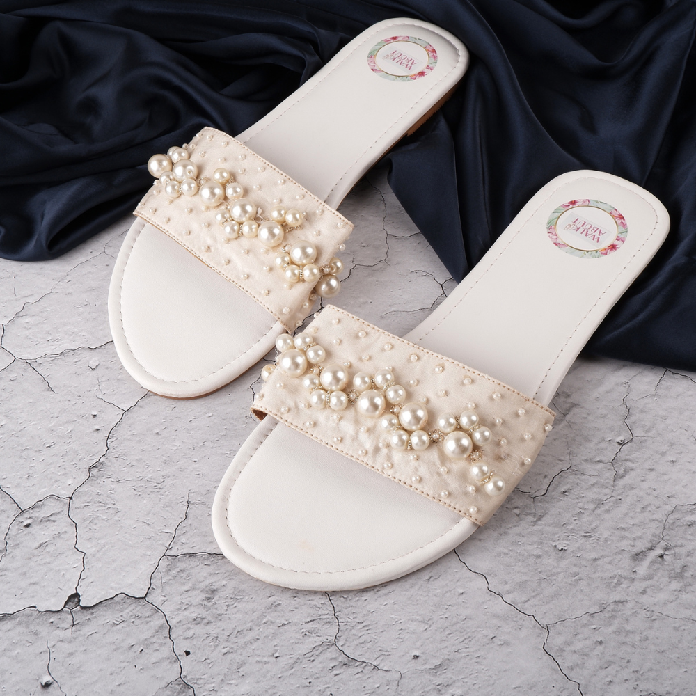 
                  
                    Hand-embroidered Back-open Sliders
                  
                
