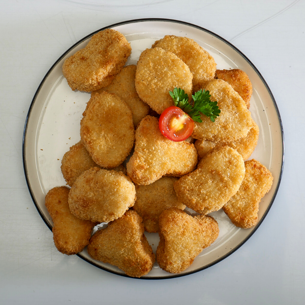 
                  
                    Blue Tribe Plant-Based Chicken Nuggets (250g)
                  
                