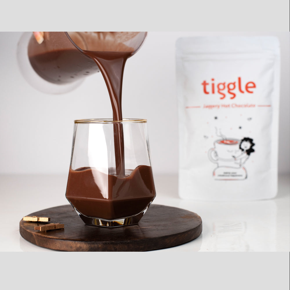 
                  
                    Tiggle Jaggery Hot Chocolate Mix | 10 cups pack
                  
                