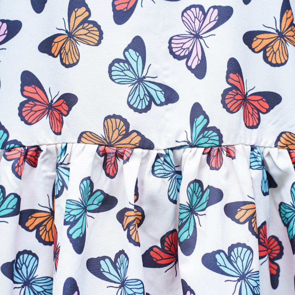 
                  
                    Beige Butterfly Print Dress
                  
                