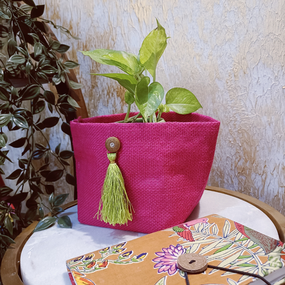 
                  
                    Empower Studio Jute Pink Planter Cover with Tassels
                  
                