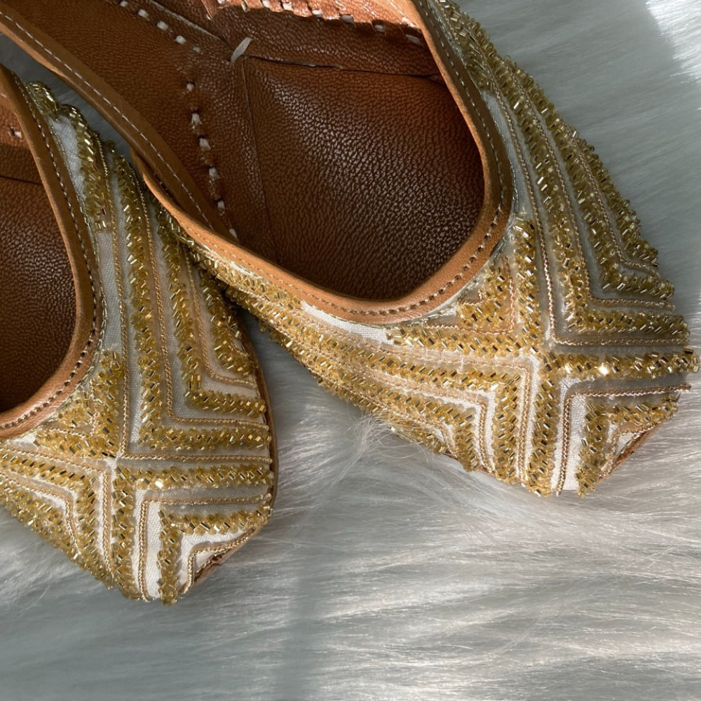 
                  
                    Double-Cushioned Hand-embroidered Jhuttis
                  
                