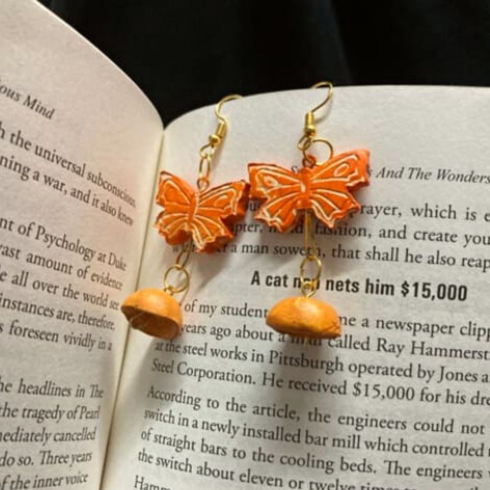 
                  
                    Butterfly Clay Hanging Earrings
                  
                