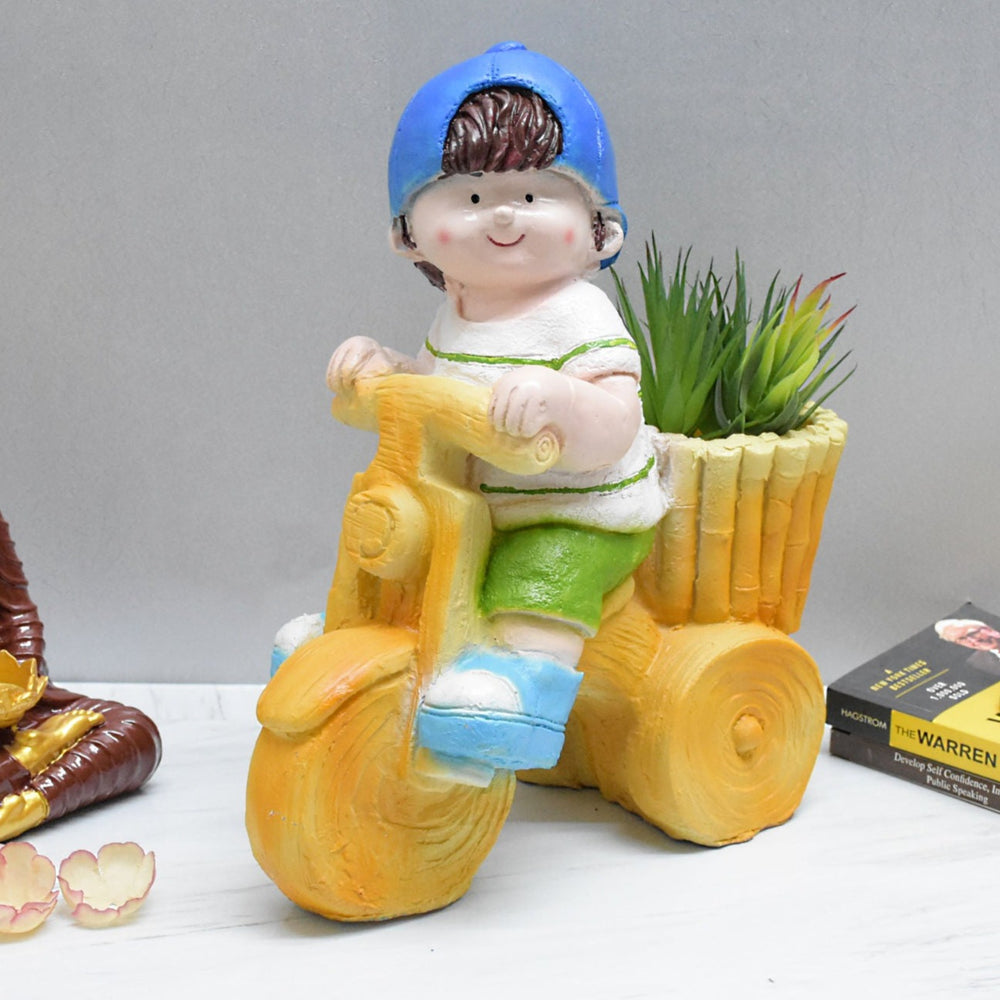 Boy Riding Bike Planter