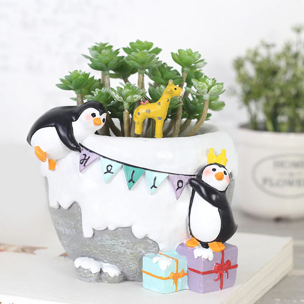 
                  
                    Penguins Celebrating Planter & Pot
                  
                