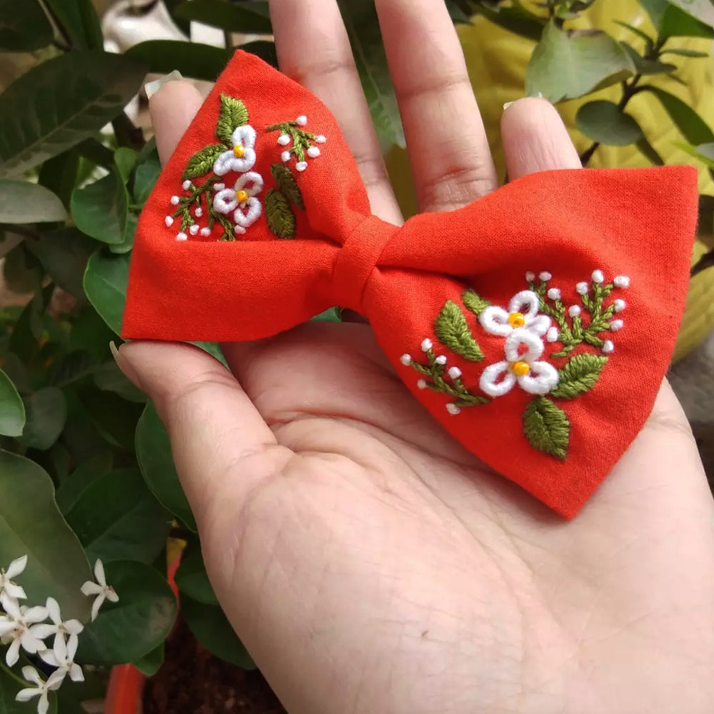 
                  
                    Tangrine Embroidered Bow Clip
                  
                