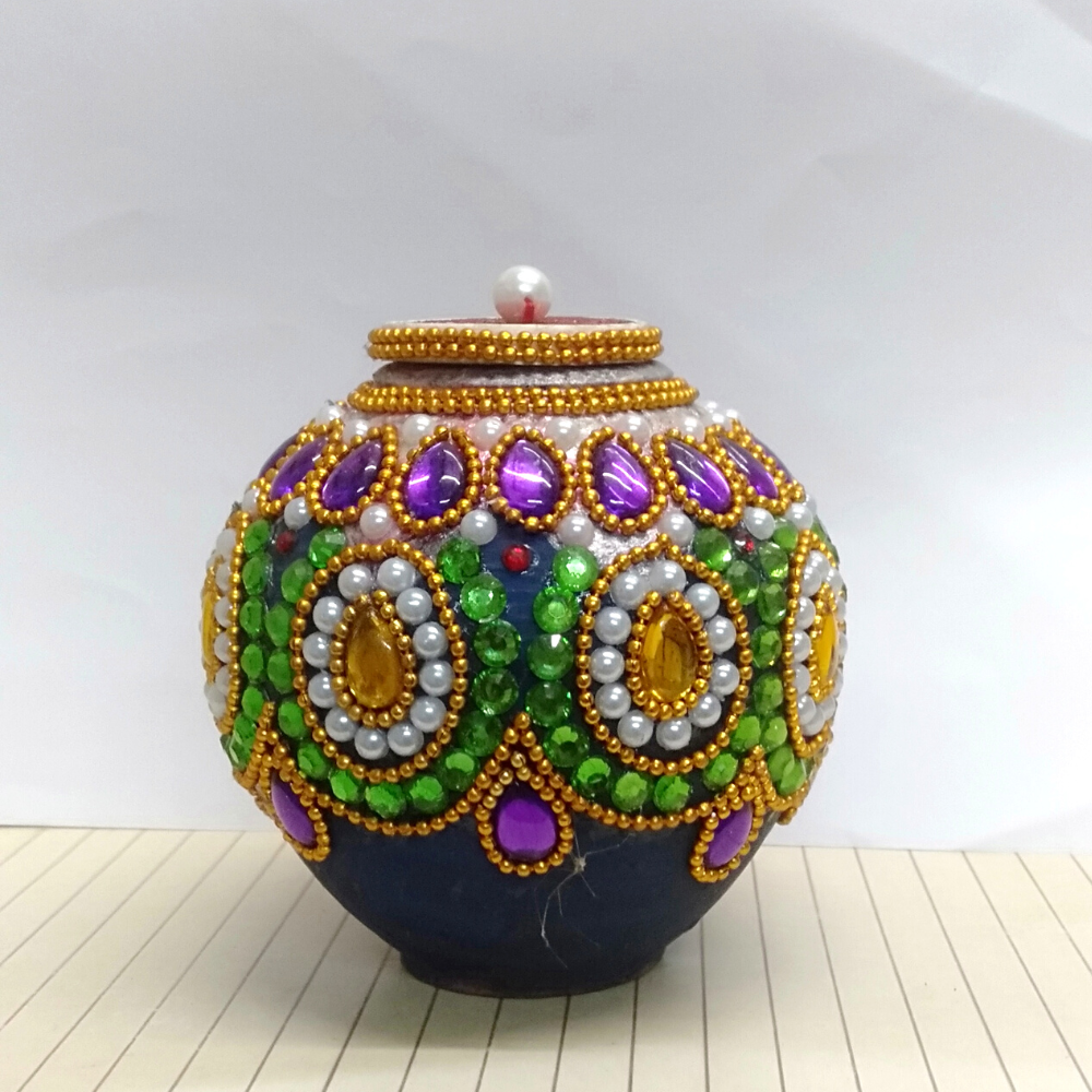 
                  
                    Kundan Decorated Clay Pot
                  
                