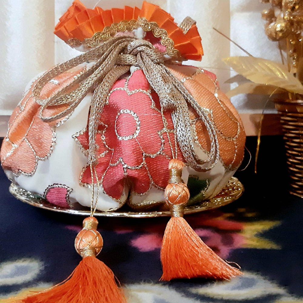 
                  
                    Handcrafted Floral Matka Potli
                  
                
