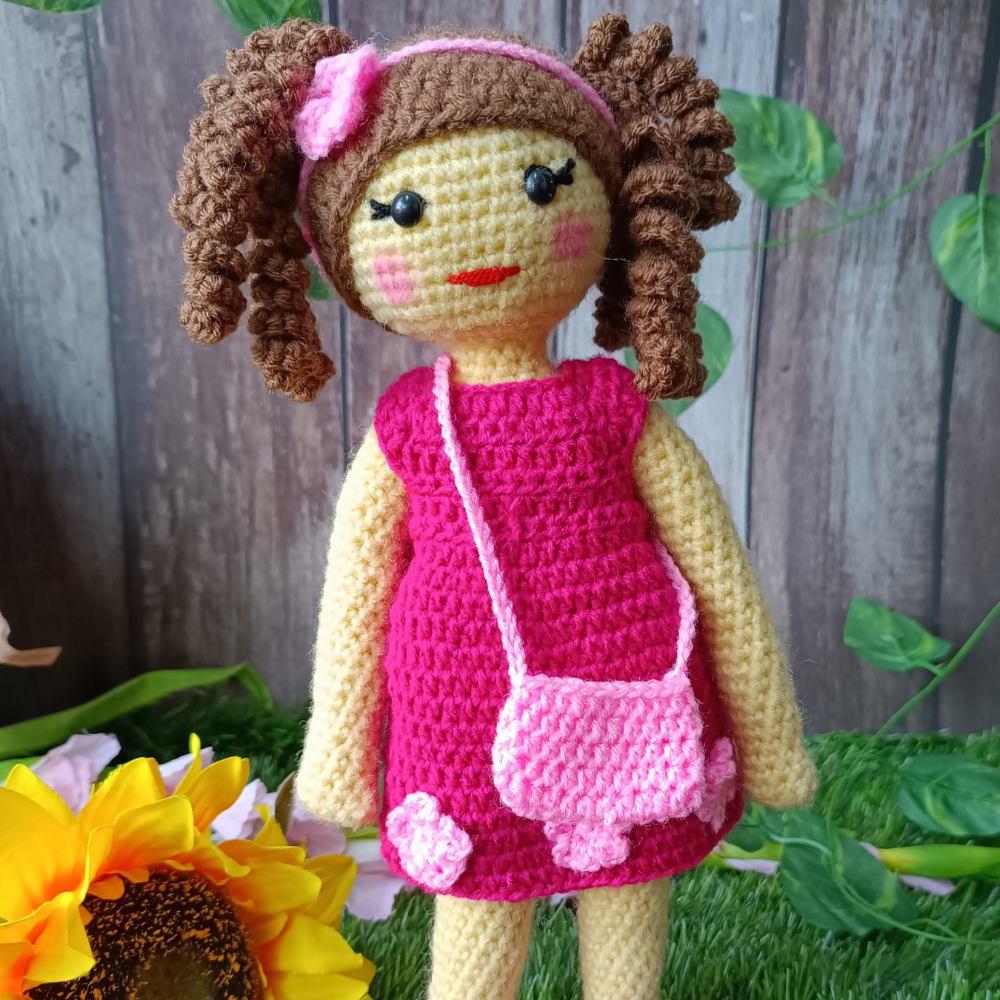 
                  
                    Hand-Crocheted Doll
                  
                