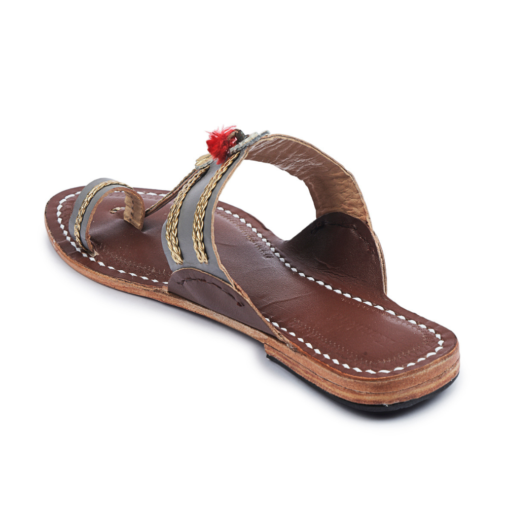 
                  
                    Korakori Headturner Grey Kolhapuri Slippers
                  
                