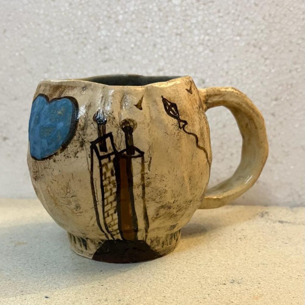
                  
                    Ceramic Hand-Painted Mug
                  
                