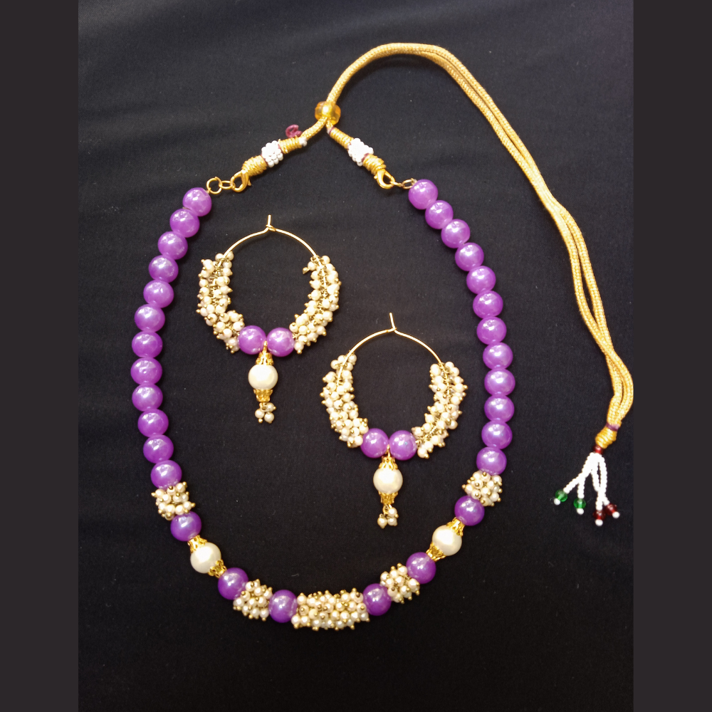 
                  
                    Handmade Necklace Set with Hoop Earrings
                  
                