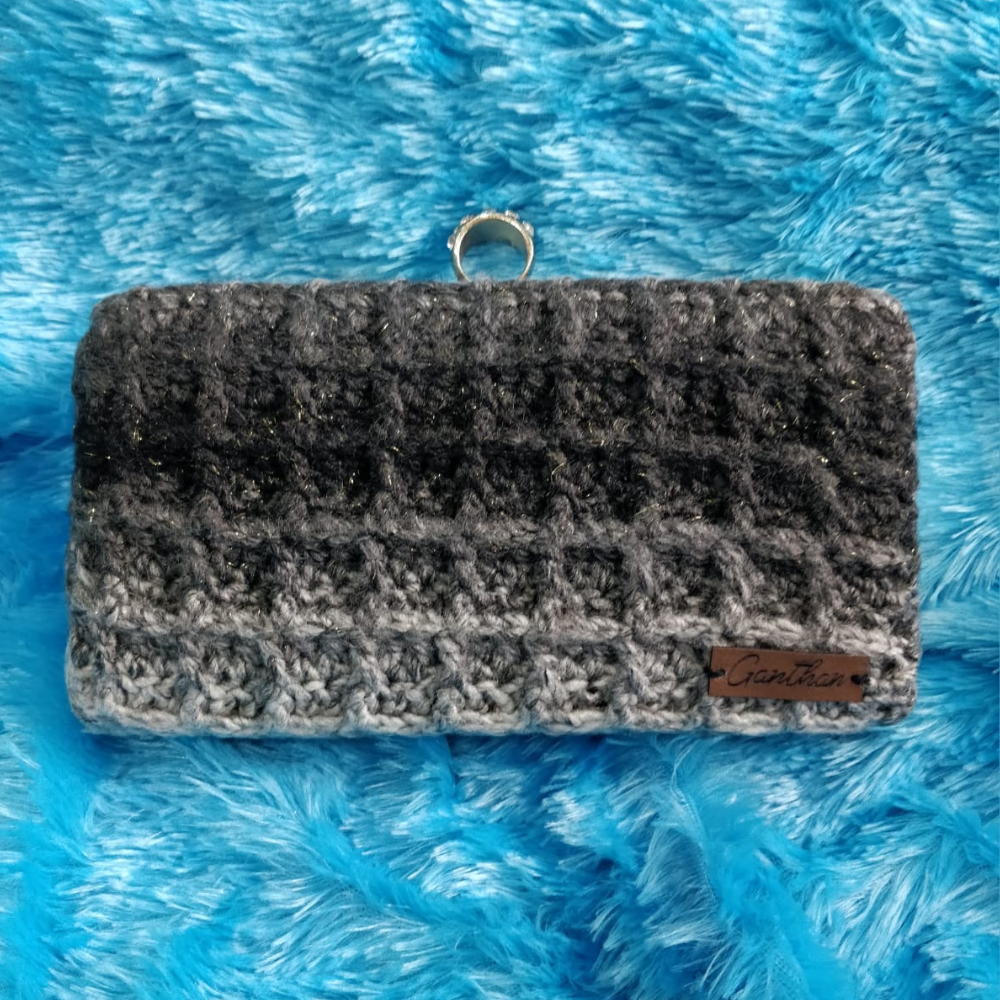 
                  
                    Handmade Clutch
                  
                