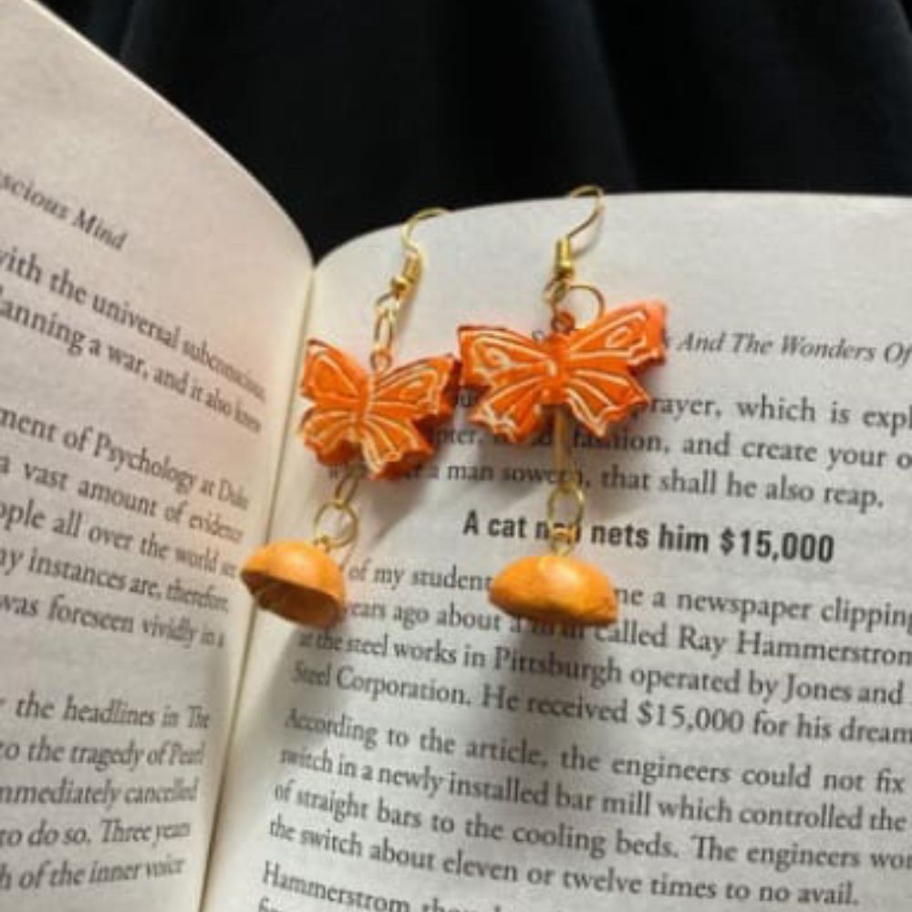 
                  
                    Butterfly Clay Hanging Earrings
                  
                