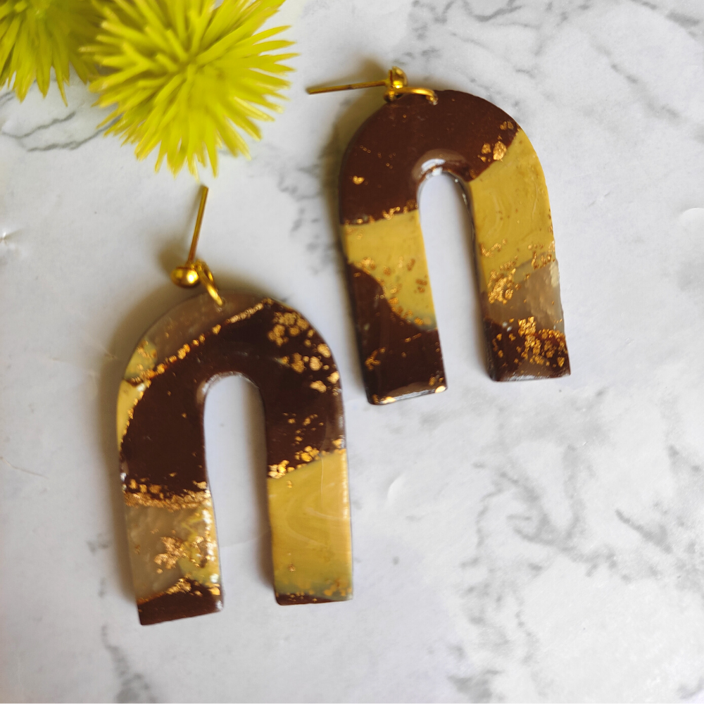 
                  
                    Brown Arches Polymer Clay Earrings
                  
                