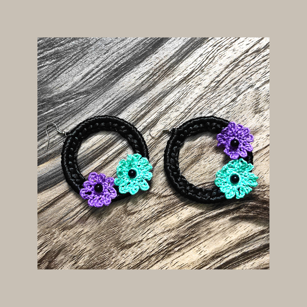 
                  
                    "Black silky rings"earring
                  
                