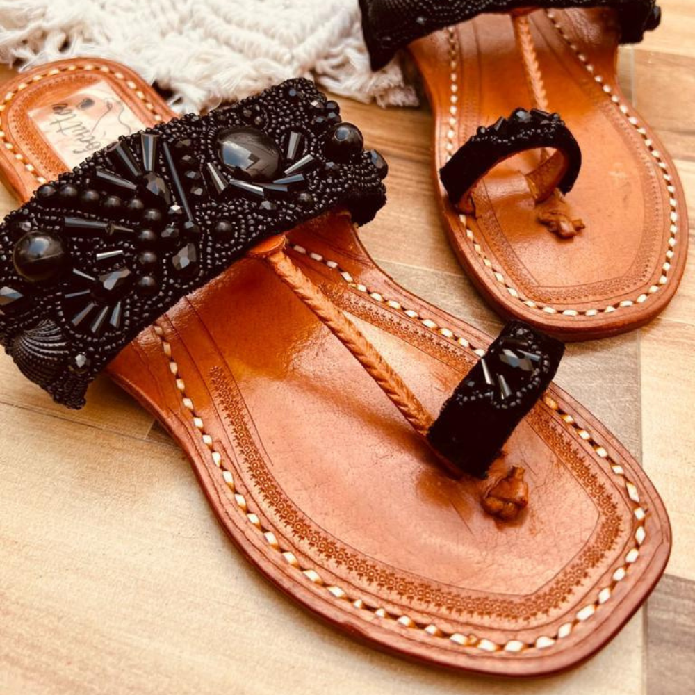 
                  
                    Blossom Black Kolhapuri Sandals
                  
                