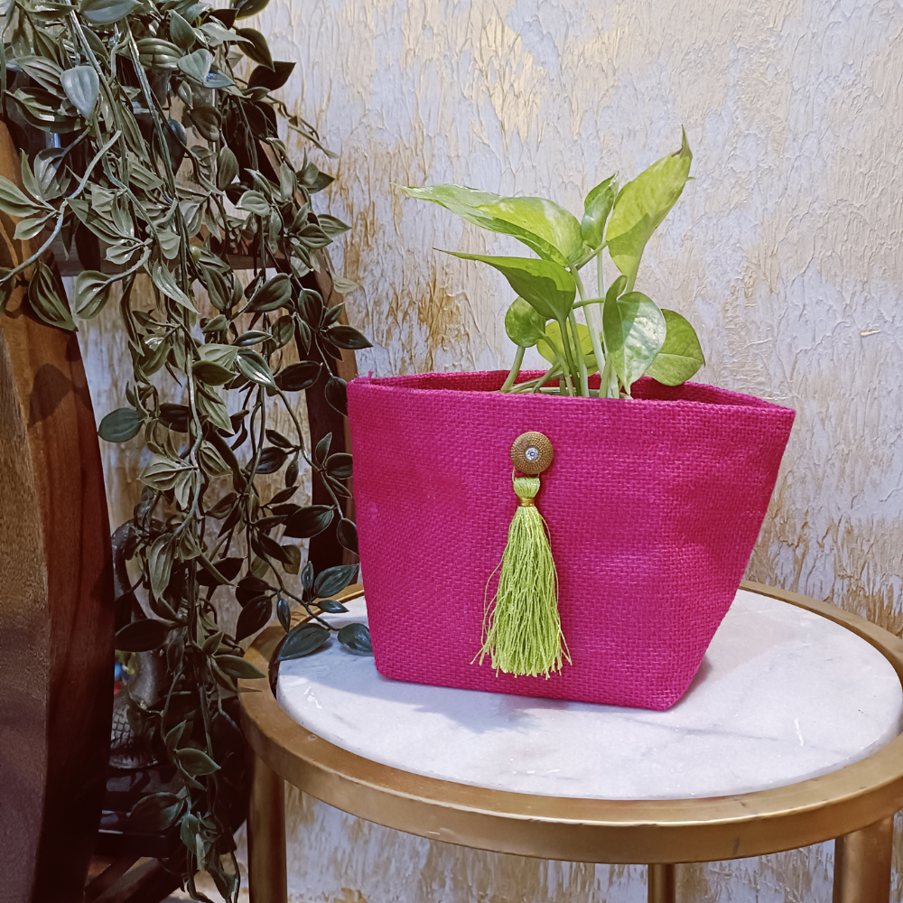 
                  
                    Empower Studio Jute Pink Planter Cover with Tassels
                  
                