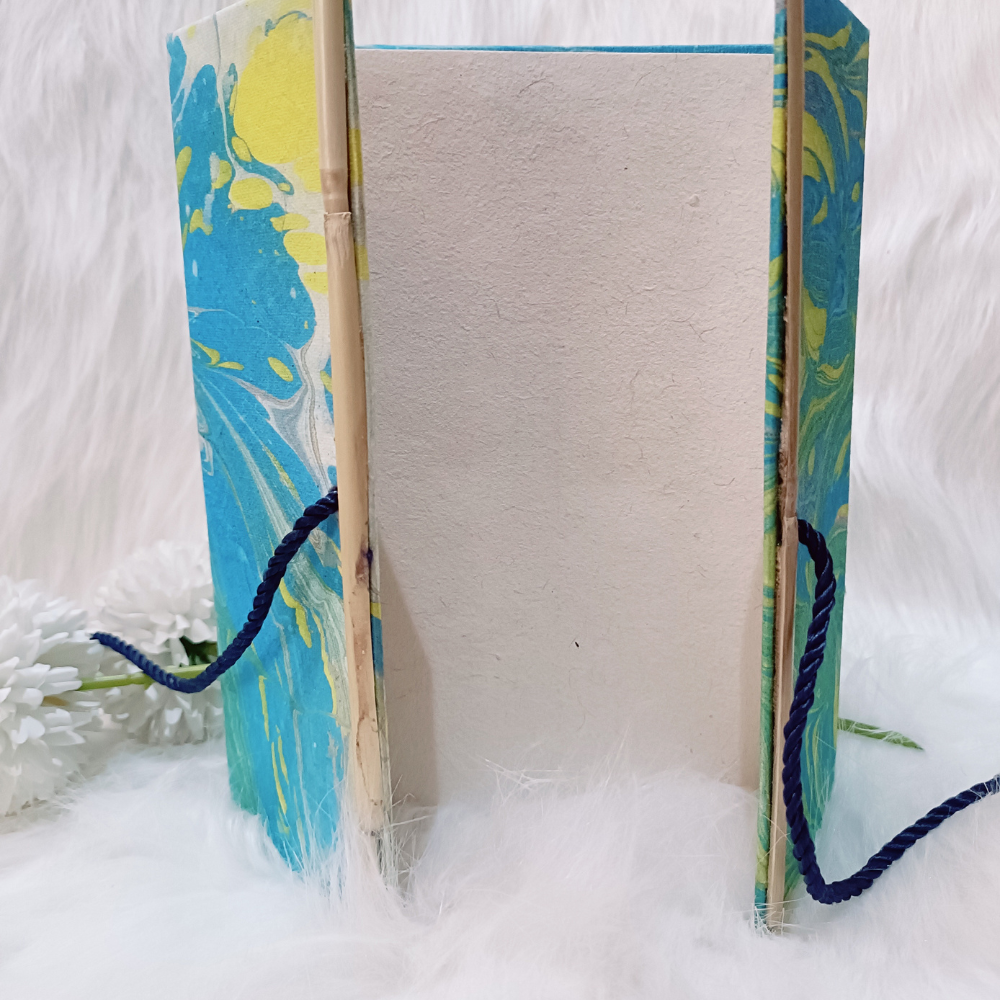 
                  
                    Empower Studio Marble Marvel Blue Handmade Paper Diary with Centre Opening
                  
                