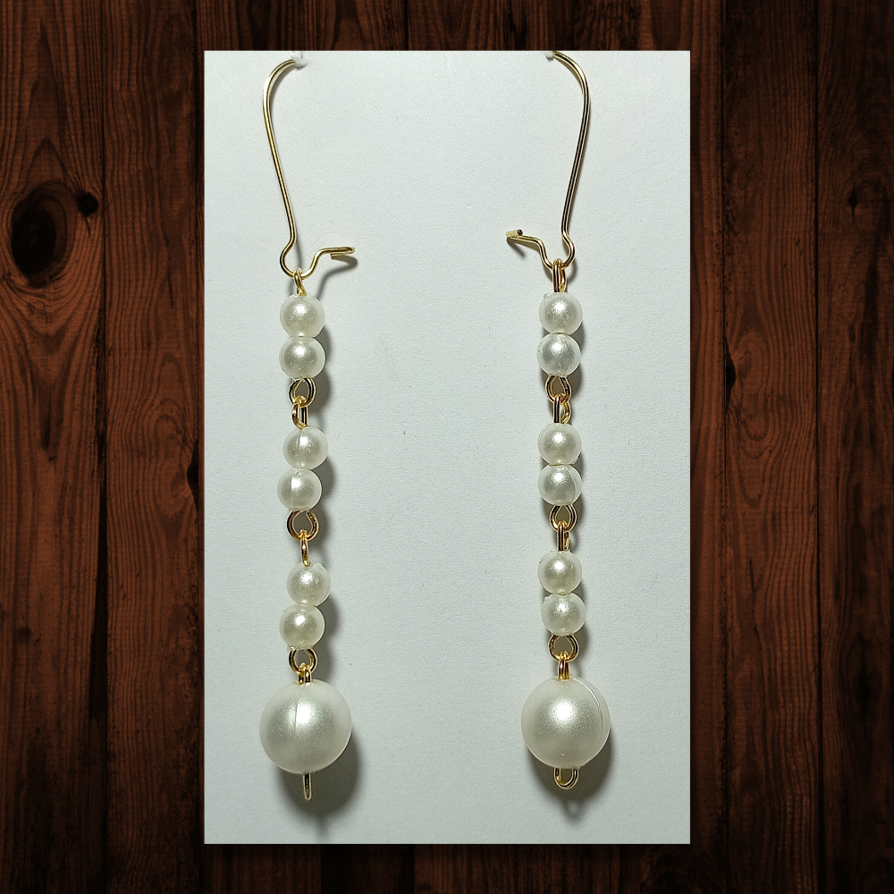 
                  
                    White Beaded Earrings
                  
                