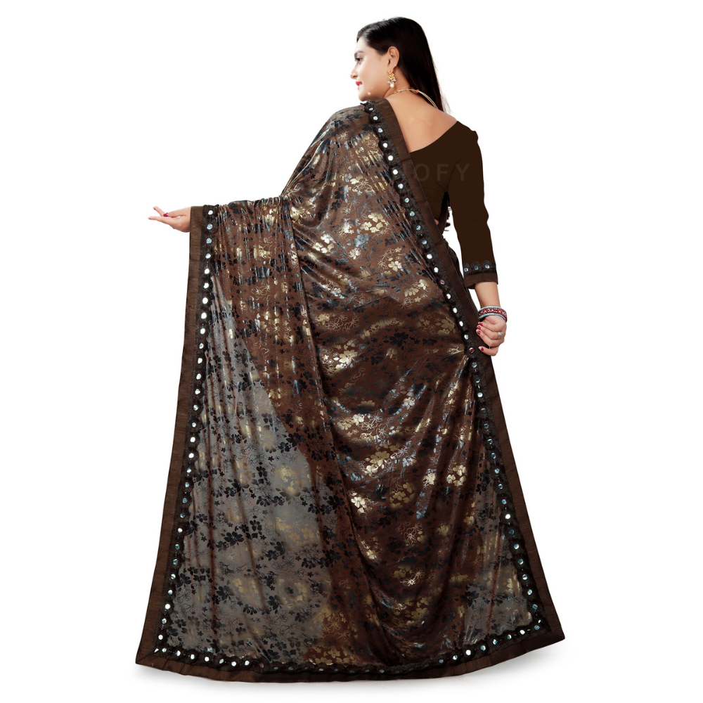 
                  
                    Foil Printed Brown Half and Half Ruffle Saree with Heavy Rakhdi Lace
                  
                