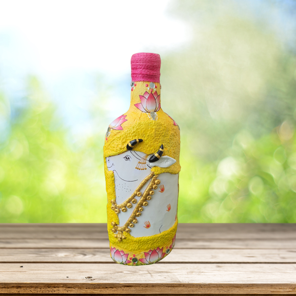 
                  
                    The Yellow Pichwai Cow Bottle Art
                  
                