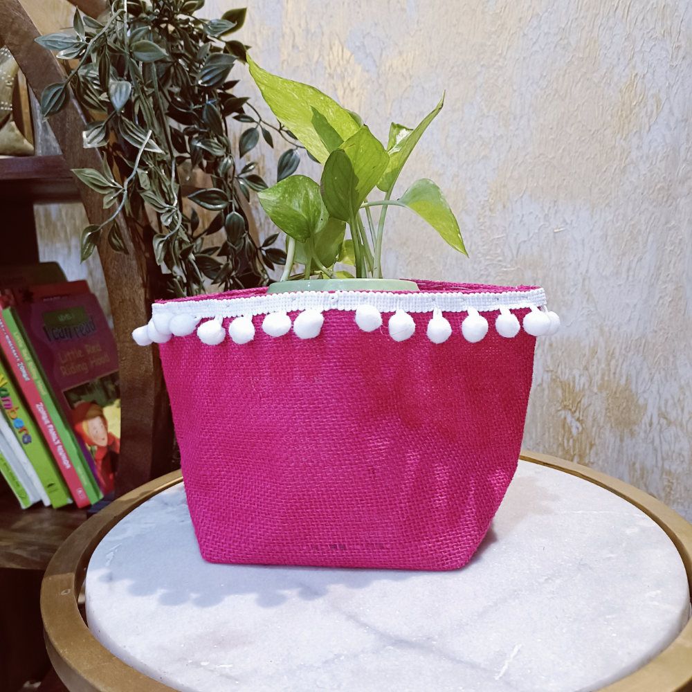 
                  
                    Empower Studio Pink Jute Planter Cover with Pompoms
                  
                
