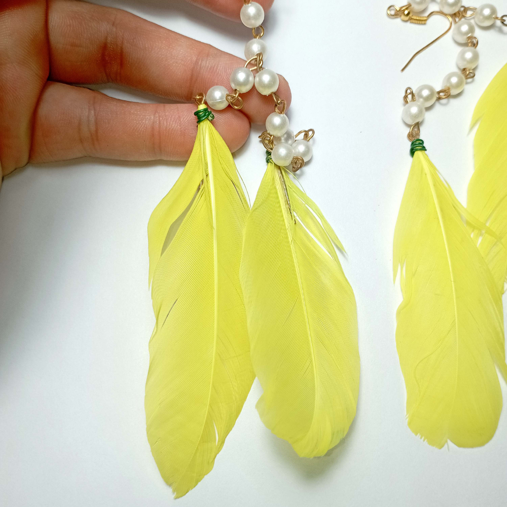 
                  
                    Feather Earrings
                  
                