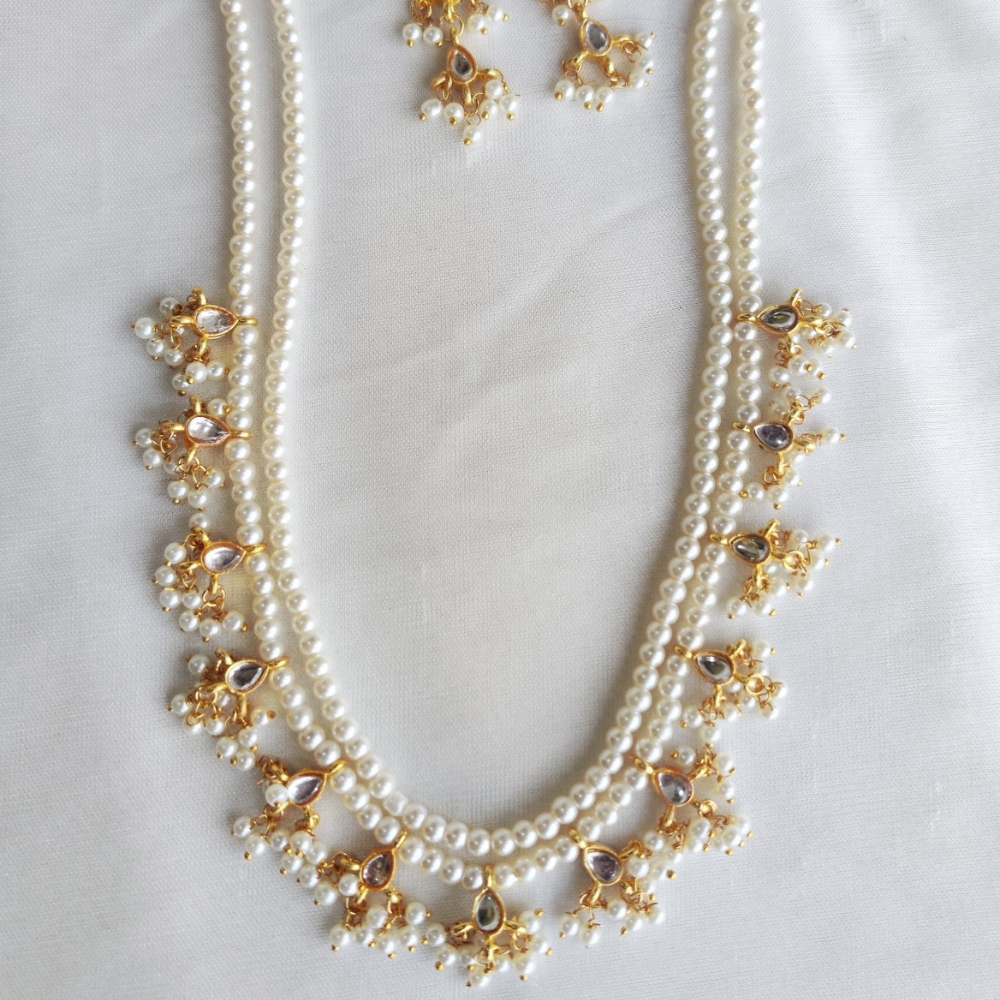 
                  
                    Vedaj Kundan Pearl Necklace Set
                  
                