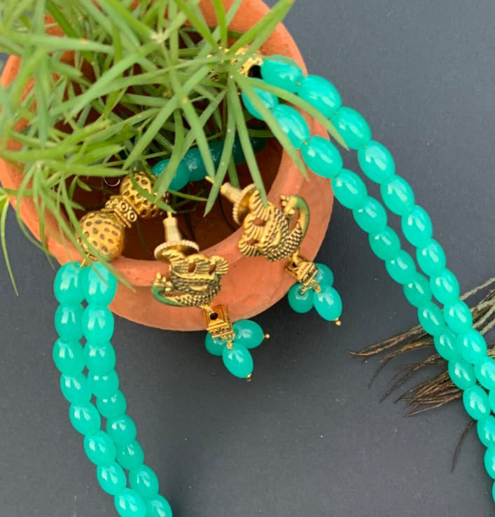 
                  
                    Turquoise Blue Glass Beads Necklace
                  
                